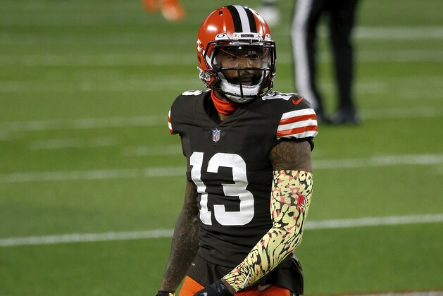 Cleveland Browns wide receiver Odell Beckham Jr. (13) warms up prior to the start of an NFL football game against the Cincinnati Bengals, Thursday, Sept. 17, 2020, in Cleveland. (AP Photo/Kirk Irwin)