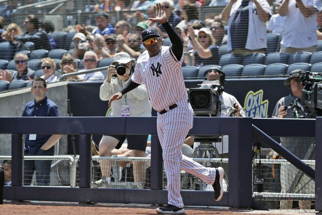 Former New York Yankee Marcus Thames is introduced during Old Timer's Day at Yankee Stadium, Sunday, June 23, 2019, in New York. (AP Photo/Seth Wenig)