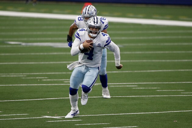 Dallas Cowboys quarterback Dak Prescott (4) finds running room against the Atlanta Falcons in the first half of an NFL football game in Arlington, Texas, Sunday, Sept. 20, 2020. (AP Photo/Ron Jenkins)