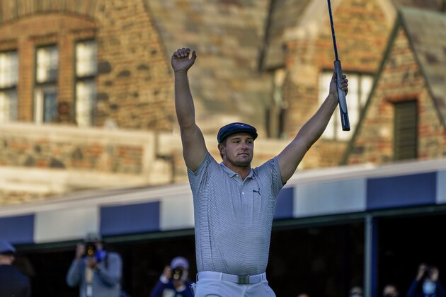 DUPLICATE*** Bradley Dredge, of Wales,*** Brad Dalke, of the United States,*** Bryson DeChambeau, of the United States, reacts after sinking a putt for par on the 18th hole to win the US Open Golf Championship, Sunday, Sept. 20, 2020, in Mamaroneck, N.Y. (AP Photo/Charles Krupa)