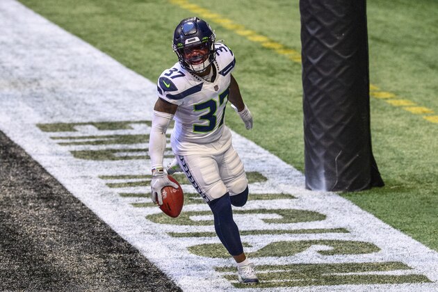 Seattle Seahawks strong safety Quandre Diggs (37) celebrates during the second half of an NFL football game against the Atlanta Falcons, Sunday, Sept. 13, 2020, in Atlanta. The Seattle Seahawks won 38-25. (AP Photo/Danny Karnik) Seattle Seahawks strong safety Quandre Diggs (37) celebrates during the second half of an NFL football game against the Atlanta Falcons, Sunday, Sept. 13, 2020, in Atlanta. The Seattle Seahawks won 38-25. (AP Photo/Danny Karnik)