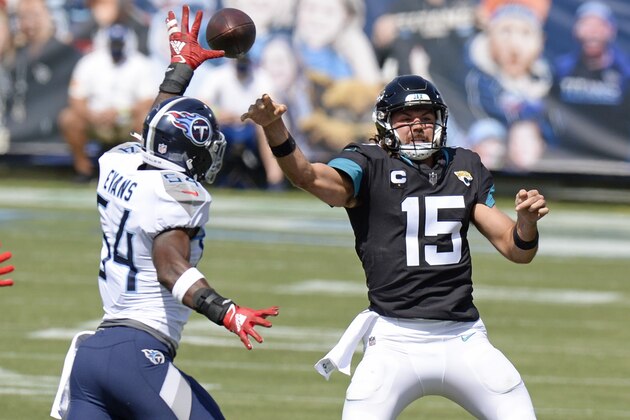 Jacksonville Jaguars quarterback Gardner Minshew (15) passes as he is pressured by Tennessee Titans inside linebacker Rashaan Evans (54) in the first half of an NFL football game Sunday, Sept. 20, 2020, in Nashville, Tenn. (AP Photo/Mark Zaleski) Jacksonville Jaguars quarterback Gardner Minshew (15) passes as he is pressured by Tennessee Titans inside linebacker Rashaan Evans (54) in the first half of an NFL football game Sunday, Sept. 20, 2020, in Nashville, Tenn. (AP Photo/Mark Zaleski)