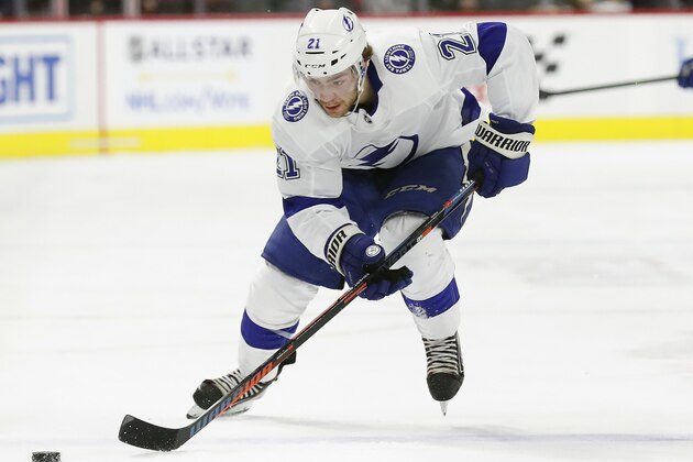 Tampa Bay Lightning center Brayden Point (21) skates against the Carolina Hurricanes during the first period of an NHL hockey game in Raleigh, N.C., Sunday, Jan. 5, 2020. (AP Photo/Gerry Broome)