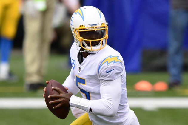 Los Angeles Chargers quarterback Tyrod Taylor (5) looks to pass the ball during an NFL football game against the Cincinnati Bengals, Sunday, Sept. 13, 2020, in Cincinnati. (AP Photo/Emilee Chinn)