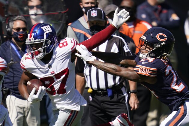 New York Giants wide receiver Sterling Shepard (87) is pushed by Chicago Bears cornerback Buster Skrine (24) during the first half of an NFL football game in Chicago, Sunday, Sept. 20, 2020. (AP Photo/Charles Rex Arbogast)