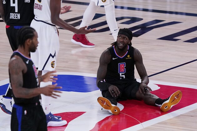 Los Angeles Clippers forward Montrezl Harrell (5) reacts after a play against the Denver Nuggets during the second half of an NBA conference semifinal playoff basketball game Tuesday, Sept. 15, 2020, in Lake Buena Vista, Fla. (AP Photo/Mark J. Terrill)