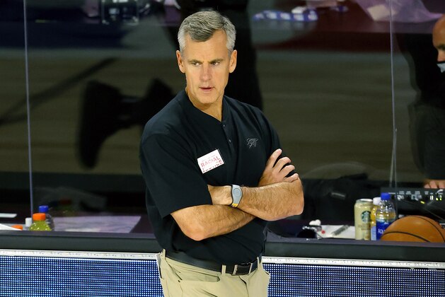 Oklahoma City Thunder head coach Billy Donovan looks on during the first quarter of an NBA basketball game against the Phoenix Suns, Monday, Aug. 10, 2020, in Lake Buena Vista, Fla. (Mike Ehrmann/Pool Photo via AP)
