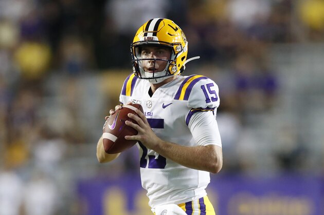 LSU quarterback Myles Brennan (15) looks to pass during an NCAA football game against Georgia Southern, Saturday, Aug. 31, 2019, in Baton Rouge, La. Brennan is well on his way to becoming a poster boy for upheld commitments and delayed gratification. All thatâ€™s left now is to finally fulfill the promise he showed as a record-setting Mississippi high school passer, who in 2016 became one of the most coveted quarterback recruits to commit to LSU during the tenure of ex-Tigers head coach Les Miles. (AP Photo/Tyler Kaufman)