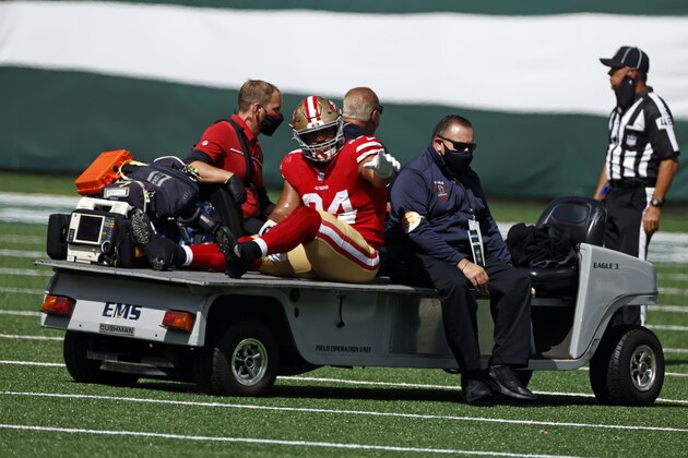San Francisco 49ers defensive end Solomon Thomas (94) is tended to by team doctors against the New York Jets during an NFL football game, Sunday, Sept. 20, 2020, in East Rutherford, N.J. (AP Photo/Adam Hunger)