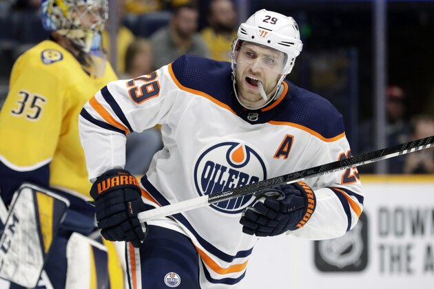 FILE - In this Monday, March 2, 2020, file photo, Edmonton Oilers center Leon Draisaitl (29), of Germany, plays against the Nashville Predators in the first period of an NHL hockey game in Nashville, Tenn. Draisaitl scored four goals as the Oilers won 8-3. NHL leading scorer Leon Draisaitl of the Oilers, Avalanche center Nathan MacKinnon and Rangers winger Artemi Panarin are the finalists for the Ted Lindsay Award. The trophy goes to the league's most outstanding player as voted by fellow players.(AP Photo/Mark Humphrey, File)