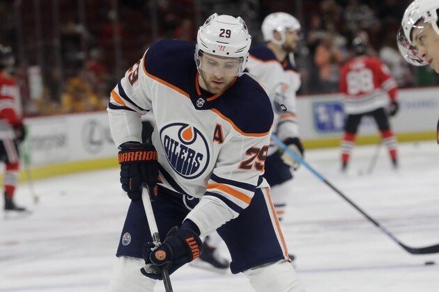 Edmonton Oilers center Leon Draisaitl warms up before an NHL hockey game against the Chicago Blackhawks in Chicago, Thursday, March 5, 2020. (AP Photo/Nam Y. Huh)