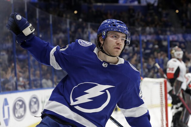 Tampa Bay Lightning center Brayden Point (21) celebrates after scoring against the Ottawa Senators during the second period of an NHL hockey game Tuesday, Dec. 17, 2019, in Tampa, Fla. (AP Photo/Chris O'Meara)
