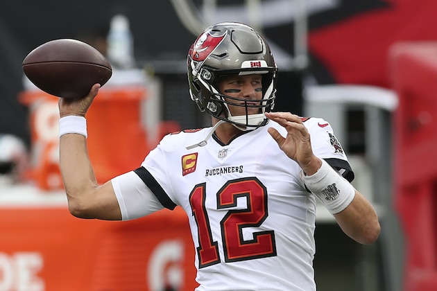 Tampa Bay Buccaneers quarterback Tom Brady (12) throws a pass before an NFL football game against the Carolina Panthers Sunday, Sept. 20, 2020, in Tampa, Fla. (AP Photo/Mark LoMoglio)