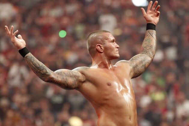 WWE Superstar Randy Orton celebrates victory during WrestleMania XXVI on March 28, 2010, at University of Phoenix Stadium in Glendale, Arizona. (AP Photo/Rick Scuteri)