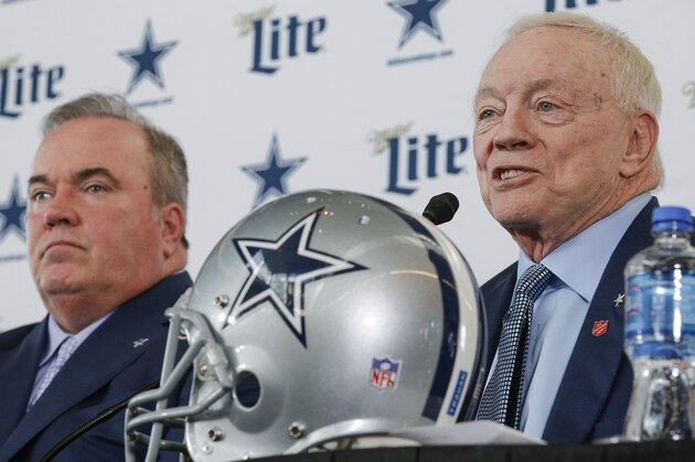 New Dallas Cowboys head coach Mike McCarthy, left, is introduced by team owner Jerry Jones, right, during a press conference at the Dallas Cowboys headquarters Wednesday, Jan. 8, 2020, in Frisco, Texas. (AP Photo/Brandon Wade)