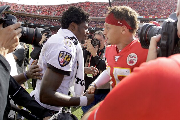 Kansas City Chiefs quarterback Patrick Mahomes, right, and Baltimore Ravens quarterback Lamar Jackson (8) greet each other after their NFL football game Sunday, Sept. 22, 2019, in Kansas City, Mo. (AP Photo/Charlie Riedel)