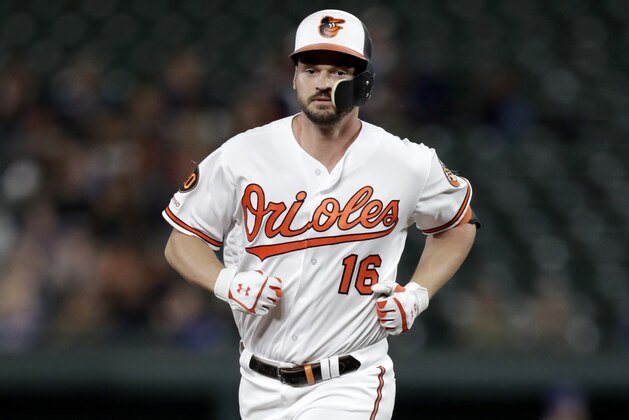 Baltimore Orioles' Trey Mancini runs the bases after hitting a two-run home run off Toronto Blue Jays starting pitcher Ryan Tepera during the first inning of a baseball game Tuesday, Sept. 17, 2019, in Baltimore. (AP Photo/Julio Cortez)