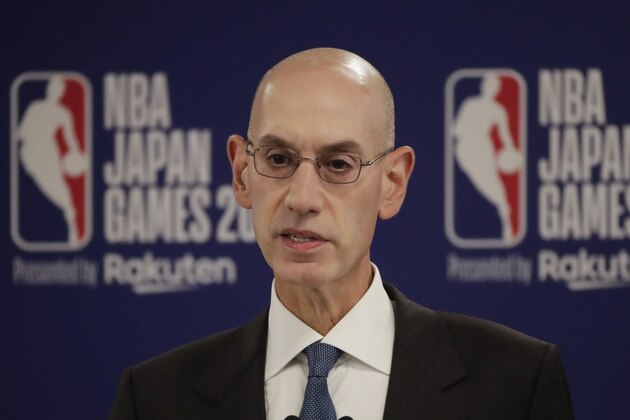 FILE - In this Oct. 8, 2019 file photo, NBA Commissioner Adam Silver speaks at a news conference before an NBA preseason basketball game between the Houston Rockets and the Toronto Raptors in Saitama, near Tokyo. When major corporations have angered Chinese authorities in recent years, the playbook calls for one thing: an apology.  The NBA, with billions at stake, has resisted that for now, though some experts wonder if such a move is inevitable. (AP Photo/Jae C. Hong)