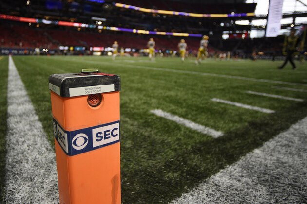 Teams warm up before the first half of the Southeastern Conference championship NCAA college football game between LSU and Georgia, Saturday, Dec. 7, 2019, in Atlanta. (AP Photo/Mike Stewart)