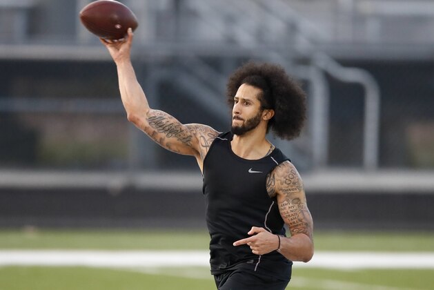 Free agent Colin Kaepernick participates in a workout for NFL football scouts and media Saturday, Nov. 16, 2019 in Riverdale, Ga. (AP Photo/Todd Kirkland)