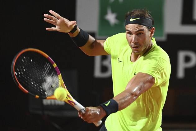 Spain's Rafael Nadal returns the ball to Argentina's Diego Schwartzman returns the ball to during their quarterfinals at the Italian Open tennis tournament, in Rome, Saturday, Sept. 19, 2020. (Alfredo Falcone/LaPresse via AP)