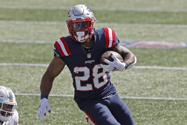 New England Patriots running back James White runs the ball against the Miami Dolphins during an NFL football game at Gillette Stadium, Sunday, Sept. 13, 2020 in Foxborough, Mass. (Winslow Townson/AP Images for Panini)