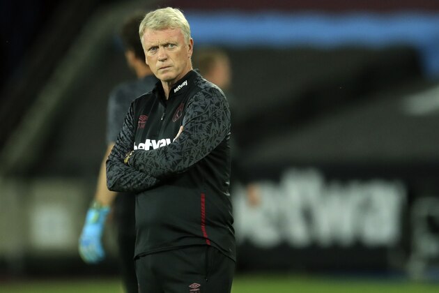 West Ham's manager David Moyes looks on during warmup before the English Premier League soccer match between West Ham United and Newcastle United at the London Stadium in London, Saturday, Sept. 12, 2020. (Adam Davy/Pool via AP)