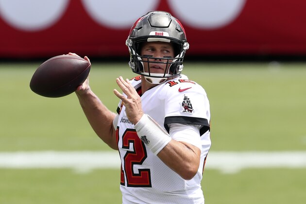 Tampa Bay Buccaneers quarterback Tom Brady (12) looks to pass against the Carolina Panthers during the first half of an NFL football game Sunday, Sept. 20, 2020, in Tampa, Fla. (AP Photo/Mark LoMoglio)