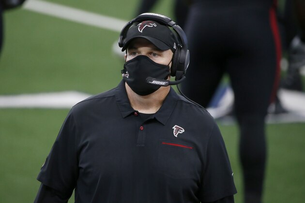 Atlanta Falcons head coach Dan Quinn watches play against the Dallas Cowboys in the first half of an NFL football game in Arlington, Texas, Sunday, Sept. 20, 2020. (AP Photo/Michael Ainsworth)