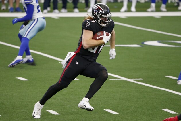 Atlanta Falcons tight end Hayden Hurst (81) gains long yardage after catching a pass in the second half of an NFL football game against the Dallas Cowboys in Arlington, Texas, Sunday, Sept. 20, 2020. (AP Photo/Michael Ainsworth)