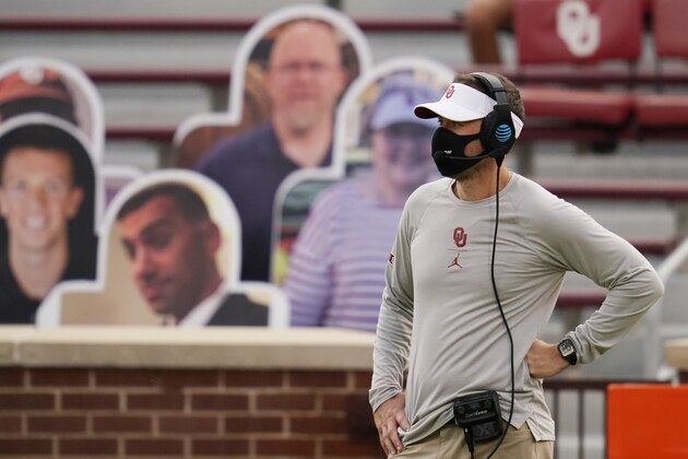 Oklahoma head coach Lincoln Riley is pictured on the sidelines in front of cut-outs of fans in the first half of an NCAA college football game against Missouri State Saturday, Sept. 12, 2020, in Norman, Okla. (AP Photo/Sue Ogrocki) Oklahoma head coach Lincoln Riley is pictured on the sidelines in front of cut-outs of fans in the first half of an NCAA college football game against Missouri State Saturday, Sept. 12, 2020, in Norman, Okla. (AP Photo/Sue Ogrocki)