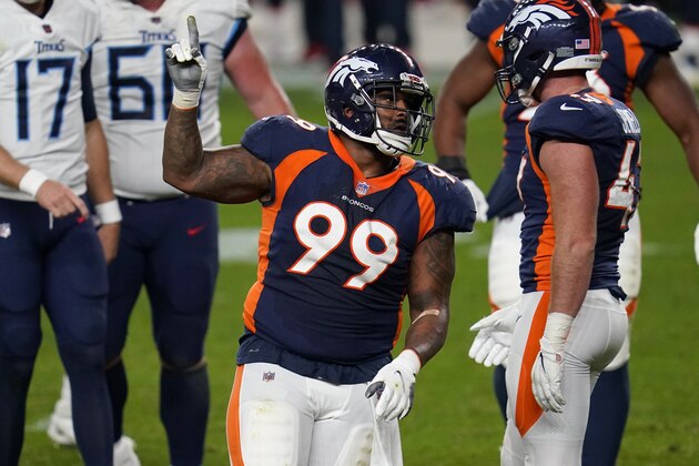 Denver Broncos defensive end Jurrell Casey (99) signals after a tipped pass against the Tennessee Titans during the second half of an NFL football game, Monday, Sept. 14, 2020, in Denver. (AP Photo/David Zalubowski)