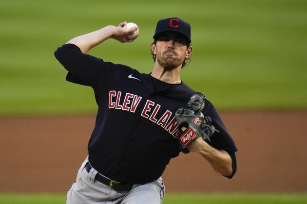 Cleveland Indians pitcher Shane Bieber throws against the Detroit Tigers in the first inning of a baseball game in Detroit, Thursday, Sept. 17, 2020. (AP Photo/Paul Sancya)