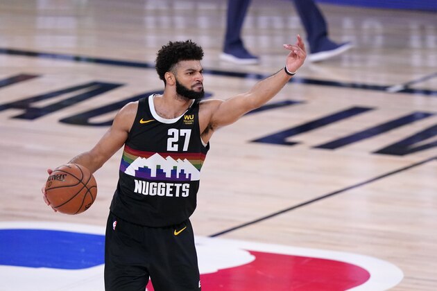 Denver Nuggets guard Jamal Murray (27) gestures during an offensive possession in the second half of Game 3 of the NBA basketball Western Conference final against the Los Angeles Lakers on Tuesday, Sept. 22, 2020, in Lake Buena Vista, Fla. (AP Photo/Mark J. Terrill)