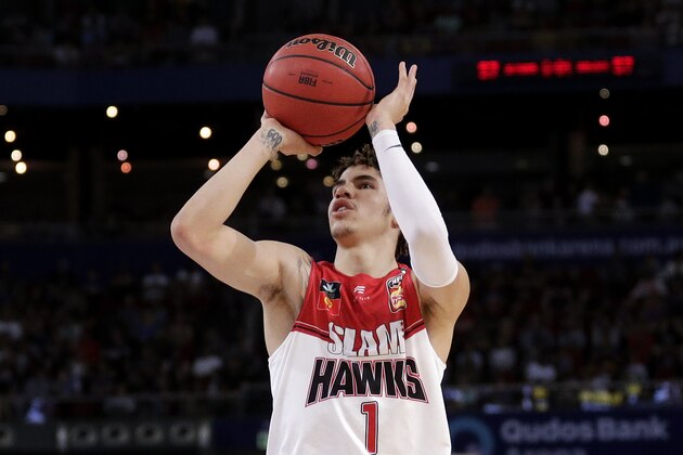 LaMelo Ball of the Illawarra Hawks shoots during their game against the Sydney Kings in the Australian Basketball League in Sydney, Sunday, Nov. 17, 2019. (AP Photo/Rick Rycroft)