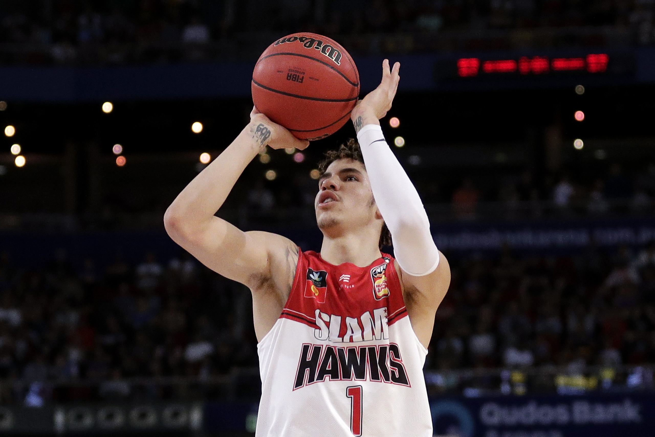 LaMelo Ball of the Illawarra Hawks shoots during their game against the Sydney Kings in the Australian Basketball League in Sydney, Sunday, Nov. 17, 2019. (AP Photo/Rick Rycroft) LaMelo Ball of the Illawarra Hawks shoots during their game against the Sydney Kings in the Australian Basketball League in Sydney, Sunday, Nov. 17, 2019. (AP Photo/Rick Rycroft)