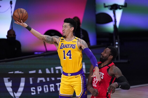 Los Angeles Lakers' Danny Green (14) goes up for a shot as Houston Rockets' Jeff Green (32) defends during the second half of an NBA conference semifinal playoff basketball game Thursday, Sept. 10, 2020, in Lake Buena Vista, Fla. (AP Photo/Mark J. Terrill)