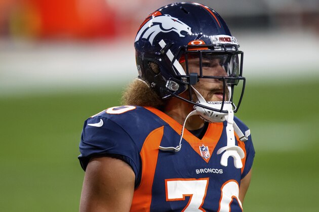 Denver Broncos running back Phillip Lindsay (30) walks on the field while warming up before an NFL football game against the Tennessee Titans, Monday, Sept. 14, 2020, in Denver. (AP Photo/Justin Edmonds)
