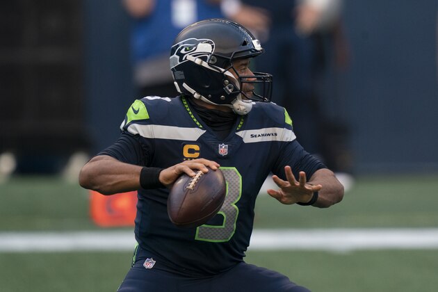 Seattle Seahawks quarterback Russell Wilson drops back to pass during the first half an NFL football game against the New England Patriots, Sunday, Sept. 20, 2020, in Seattle. The Seahawks won 35-30. (AP Photo/Stephen Brashear)