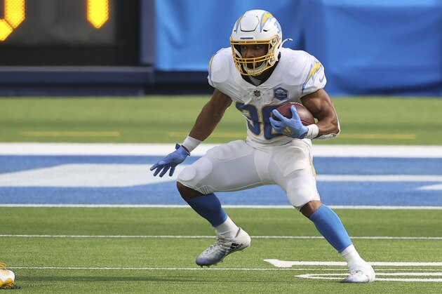 Los Angeles Chargers running back Austin Ekeler (30) eyes a defender as he rushes with the ball during an NFL football game between the between the Kansas City Chiefs and the Los Angeles Chargers, Sunday, Sept. 20, 2020, in Inglewood, Calif. (AP Photo/Peter Joneleit) Los Angeles Chargers running back Austin Ekeler (30) eyes a defender as he rushes with the ball during an NFL football game between the between the Kansas City Chiefs and the Los Angeles Chargers, Sunday, Sept. 20, 2020, in Inglewood, Calif. (AP Photo/Peter Joneleit)