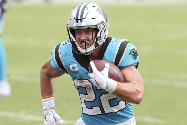 Carolina Panthers running back Christian McCaffrey (22) scores against the Tampa Bay Buccaneers during the second half of an NFL football game Sunday, Sept. 20, 2020, in Tampa, Fla. (AP Photo/Mark LoMoglio)