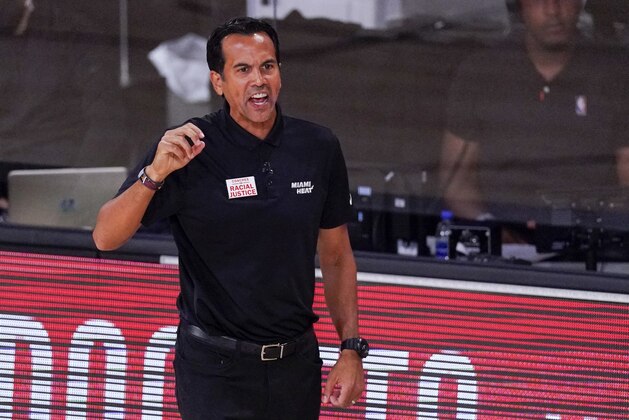 Miami Heat head coach Erik Spoelstra reacts during the first half of an NBA conference semifinal playoff basketball game against the Milwaukee Bucks Sunday, Sept. 6, 2020, in Lake Buena Vista, Fla. (AP Photo/Mark J. Terrill)