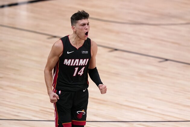 Miami Heat guard Tyler Herro (14) celebrates a basket against the Boston Celtics late in the second half of Game 4 of an NBA basketball Eastern Conference final, Wednesday, Sept. 23, 2020, in Lake Buena Vista, Fla. (AP Photo/Mark J. Terrill) Miami Heat guard Tyler Herro (14) celebrates a basket against the Boston Celtics late in the second half of Game 4 of an NBA basketball Eastern Conference final, Wednesday, Sept. 23, 2020, in Lake Buena Vista, Fla. (AP Photo/Mark J. Terrill)