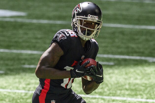 Atlanta Falcons wide receiver Calvin Ridley (18) works against the Seattle Seahawks during the first half of an NFL football game, Sunday, Sept. 13, 2020, in Atlanta. The Seattle Seahawks won 38-25. (AP Photo/Danny Karnik)