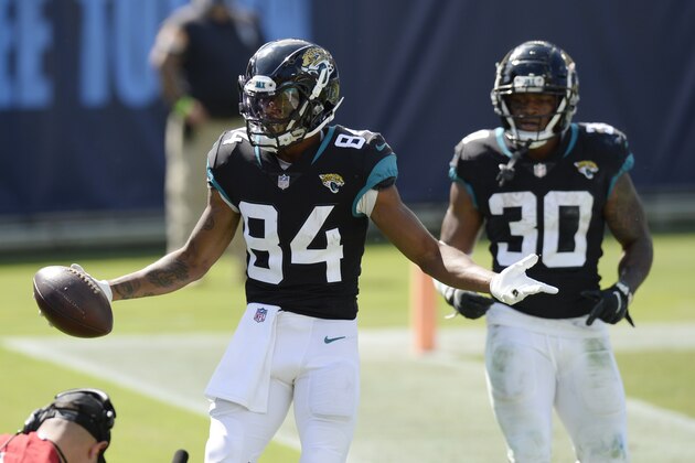 Jacksonville Jaguars wide receiver Keelan Cole (84) celebrates after scoring a touchdown against the Tennessee Titans in the second half of an NFL football game Sunday, Sept. 20, 2020, in Nashville, Tenn. (AP Photo/Mark Zaleski)