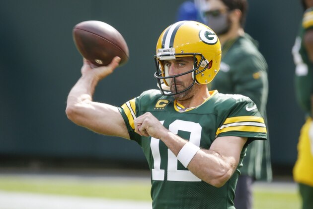 Green Bay Packers' Aaron Rodgers warms up before an NFL football game against the Detroit Lions Sunday, Sept. 20, 2020, in Green Bay, Wis. (AP Photo/Mike Roemer)