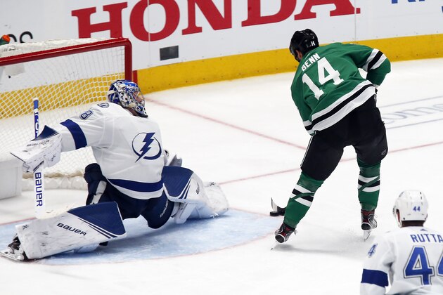 Dallas Stars left wing Jamie Benn, right, backhands the shot past Tampa Bay Lightning goaltender Andrei Vasilevskiy, left, for a goal during the third period of an NHL hockey game in Dallas, Monday, Jan. 27, 2020. (AP Photo/Ray Carlin) Dallas Stars left wing Jamie Benn, right, backhands the shot past Tampa Bay Lightning goaltender Andrei Vasilevskiy, left, for a goal during the third period of an NHL hockey game in Dallas, Monday, Jan. 27, 2020. (AP Photo/Ray Carlin)