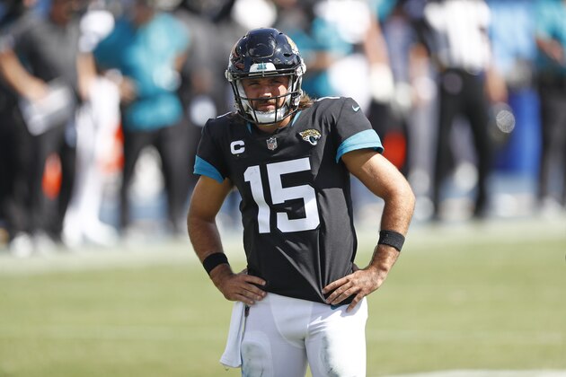 Jacksonville Jaguars quarterback Gardner Minshew (15) waits for play to resume in the second half of an NFL football game against the Tennessee Titans Sunday, Sept. 20, 2020, in Nashville, Tenn. (AP Photo/Wade Payne)