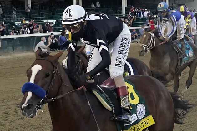 FILE - Jockey John Velazquez rides Authentic to win the 146th running of the Kentucky Derby at Churchill Downs, Saturday, Sept. 5, 2020, in Louisville, Ky. Belmont Stakes winner Tiz the Law won’t run in next month’s Preakness, spoiling what would have been a highly anticipated rematch with Kentucky Derby winner Authentic. The Preakness on Oct. 3 at Pimlico concludes this year’s reconfigured Triple Crown series, which was run out of order because of the coronavirus pandemic. (AP Photo/Jeff Roberson, File) FILE - Jockey John Velazquez rides Authentic to win the 146th running of the Kentucky Derby at Churchill Downs, Saturday, Sept. 5, 2020, in Louisville, Ky. Belmont Stakes winner Tiz the Law won’t run in next month’s Preakness, spoiling what would have been a highly anticipated rematch with Kentucky Derby winner Authentic. The Preakness on Oct. 3 at Pimlico concludes this year’s reconfigured Triple Crown series, which was run out of order because of the coronavirus pandemic. (AP Photo/Jeff Roberson, File)