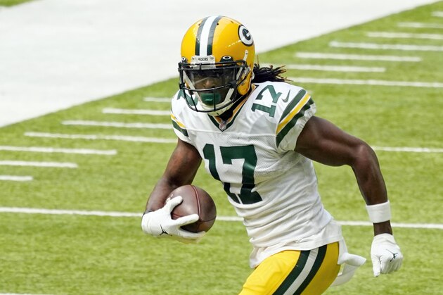 Green Bay Packers wide receiver Davante Adams (17) carries the ball in the first half of an NFL football game against the Minnesota Vikings, Sunday, Sept. 13, 2020, in Minneapolis. (AP Photo/Jim Mone)